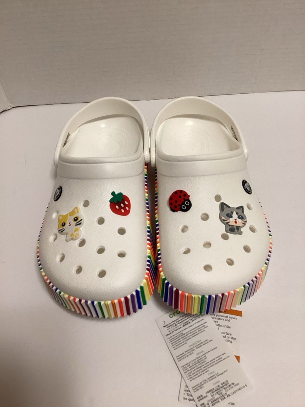 CROCS White Clog with Rainbow Soles, NWT (not attached) M7W9, 4 charms included